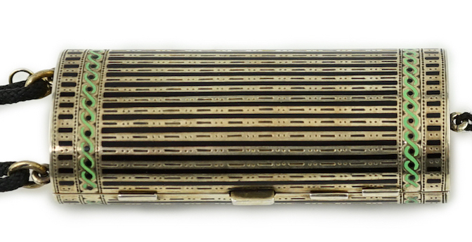 A lady's 1920's silver gilt and two colour enamel combination compact/aide memoir, import marks for Cohen & Charles